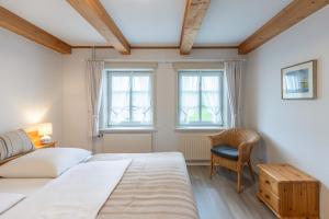 Direkt am Deich - Ferienwohnung Sylt im Gästehaus Am Badedeich