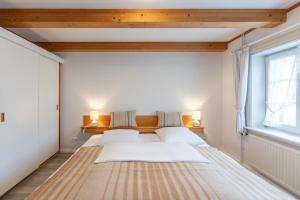 Direkt am Deich - Ferienwohnung Sylt im Gästehaus Am Badedeich