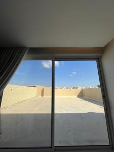شقة رووف السلامة بجوار التسوق والمطاعم الحيوية,al salma condo