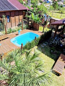 Praia do Rosa SC chalés piscina compartilhada