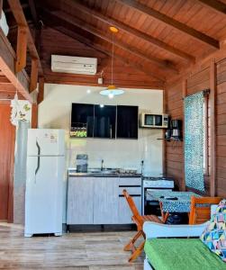 Praia do Rosa SC chalés piscina compartilhada