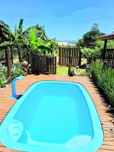 Praia do Rosa SC chalés piscina compartilhada