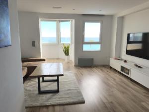 Lujoso apartamento en primera linea de playa