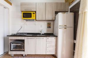 Casa 2 quartos, 6 pessoas, perto da praia, ar condicionado, wi-fi, cozinha completa, lavanderia,