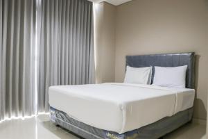 Strategic and Elegant 2BR at Ciputra International Apartment By Travelio
