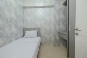 Strategic and Restful 2BR at Bassura City Apartment By Travelio