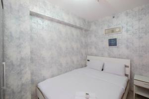 Strategic and Restful 2BR at Bassura City Apartment By Travelio