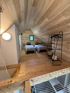 Chalets Cottage du Mauberme avec bain nordique : photos des chambres