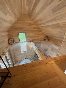 Chalets Cottage du Valier avec bain nordique : photos des chambres