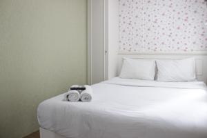 Cozy Studio Apartment at Grand Asia Afrika By Travelio