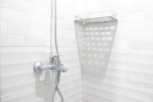 Cozy Studio Apartment at Grand Asia Afrika By Travelio