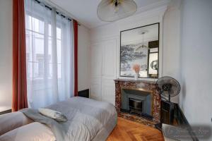 Appartements La Suite en Rose - Spa - Lyon Centre Brotteaux : photos des chambres