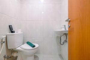 Minimalist Studio Apartment at Evenciio Margonda By Travelio