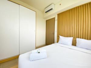 Best Deal and Restful 3BR Meikarta Apartment By Travelio