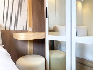 Cozy Living and Comfort 3BR Meikarta Apartment By Travelio