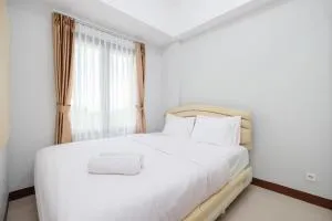 Comfort and Modern 2BR at Royal Heights Apartment By Travelio - Sampal 2