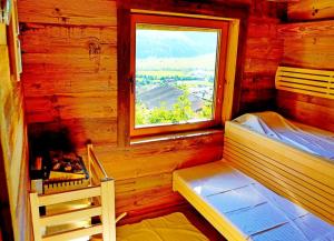 Panorama Ferienhaus Ematberg mit Bergblick und Sauna