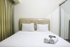 Full Furnished with Simply Look Studio at Springlake Summarecon Bekasi Apartment By Travelio