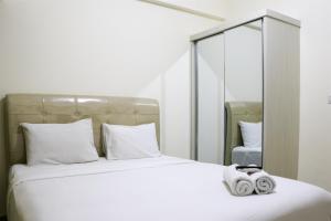 Full Furnished with Simply Look Studio at Springlake Summarecon Bekasi Apartment By Travelio