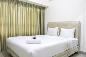 Full Furnished with Simply Look Studio at Springlake Summarecon Bekasi Apartment By Travelio