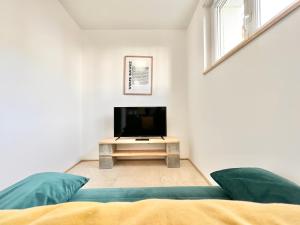 Appartements L-Esplanade - Confort & Lumineux : photos des chambres