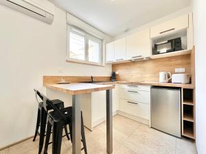 Appartements L-Esplanade - Confort & Lumineux : photos des chambres