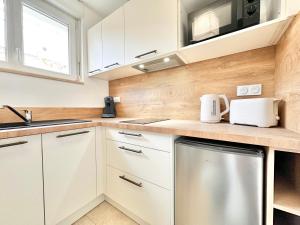 Appartements L-Esplanade - Confort & Lumineux : photos des chambres