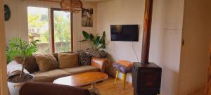 Casa soleada para cuatro personas, con patio, hamaca y parrilla