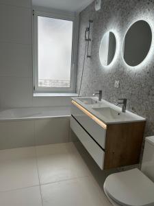 Appartements Splendide T4 en centre ville : photos des chambres