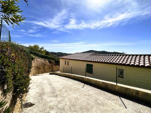 Villa Verde climatisée pour 10 personnes avec piscine chauffée et vue mer à La Londe les Maures