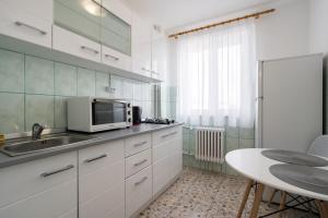 City View Apartment with Private Balcony