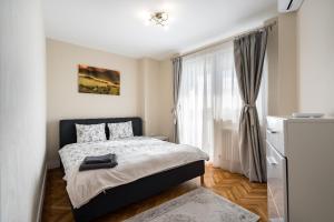 City View Apartment with Private Balcony