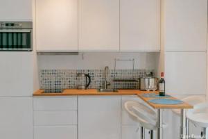 Appartements Maison chaleureuse jacuzzi, climatisation et parking payants : photos des chambres