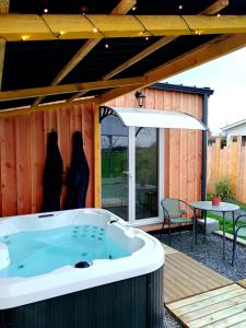 Appartements Chalet Cosy avec option Jacuzzi : photos des chambres