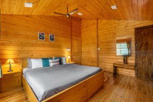 StayVista at The Woodscapes with Lawn & Views