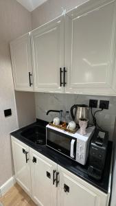 استديو فندقي بدخُول ذاتي حي العقيق c32