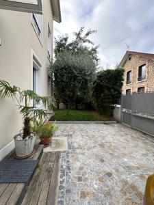 Villas YOUR OWN VILLA in COLOMBES LA DEFENSE : photos des chambres