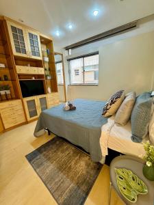 Estúdio aconchegante na Alberto Braune