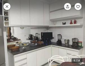 Casa confortável 3 suítes em Santos