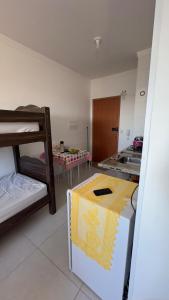 kitnet condomínio da fé