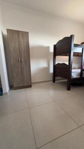 kitnet condomínio da fé