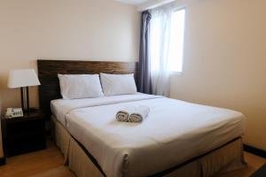 Homey and Spacious 3BR Apartment at Braga City Walk By Travelio