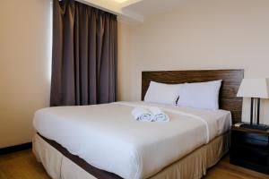 Homey and Spacious 3BR Apartment at Braga City Walk By Travelio