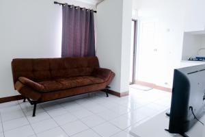 Cozy and Homey 1BR Apartment at Gateway Ahmad Yani Cicadas By Travelio