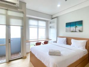 Relaxing Studio at Vasanta Innopark Apartment By Travelio