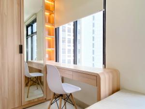 Cozy Studio Room Apartment at Pollux Chadstone By Travelio