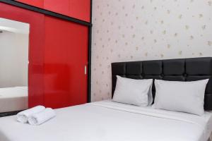 Nice and Homey 1BR at Maple Park Sunter Apartment By Travelio