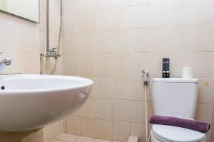 Nice and Homey 1BR at Maple Park Sunter Apartment By Travelio