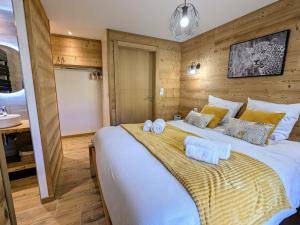 Maisons de vacances Chalet grand confort avec sauna et balneo - Proche stations de ski - FR-1-589-762 : photos des chambres