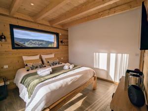 Maisons de vacances Chalet grand confort avec sauna et balneo - Proche stations de ski - FR-1-589-762 : photos des chambres